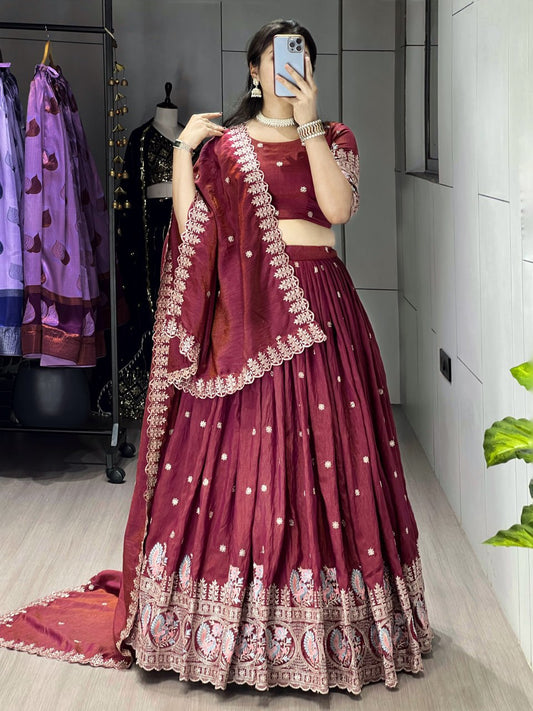 Dazzle in our embroidered burgundy lehenga
