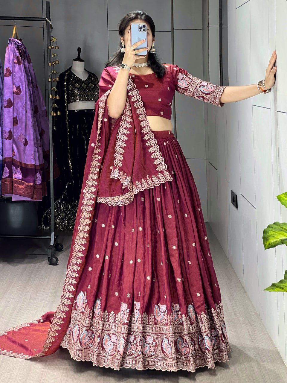 Dazzle in our embroidered burgundy lehenga