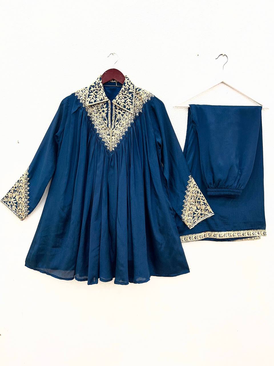 2-Piece Stylish Ensemble Includes a well fitted top and coordinated bottom