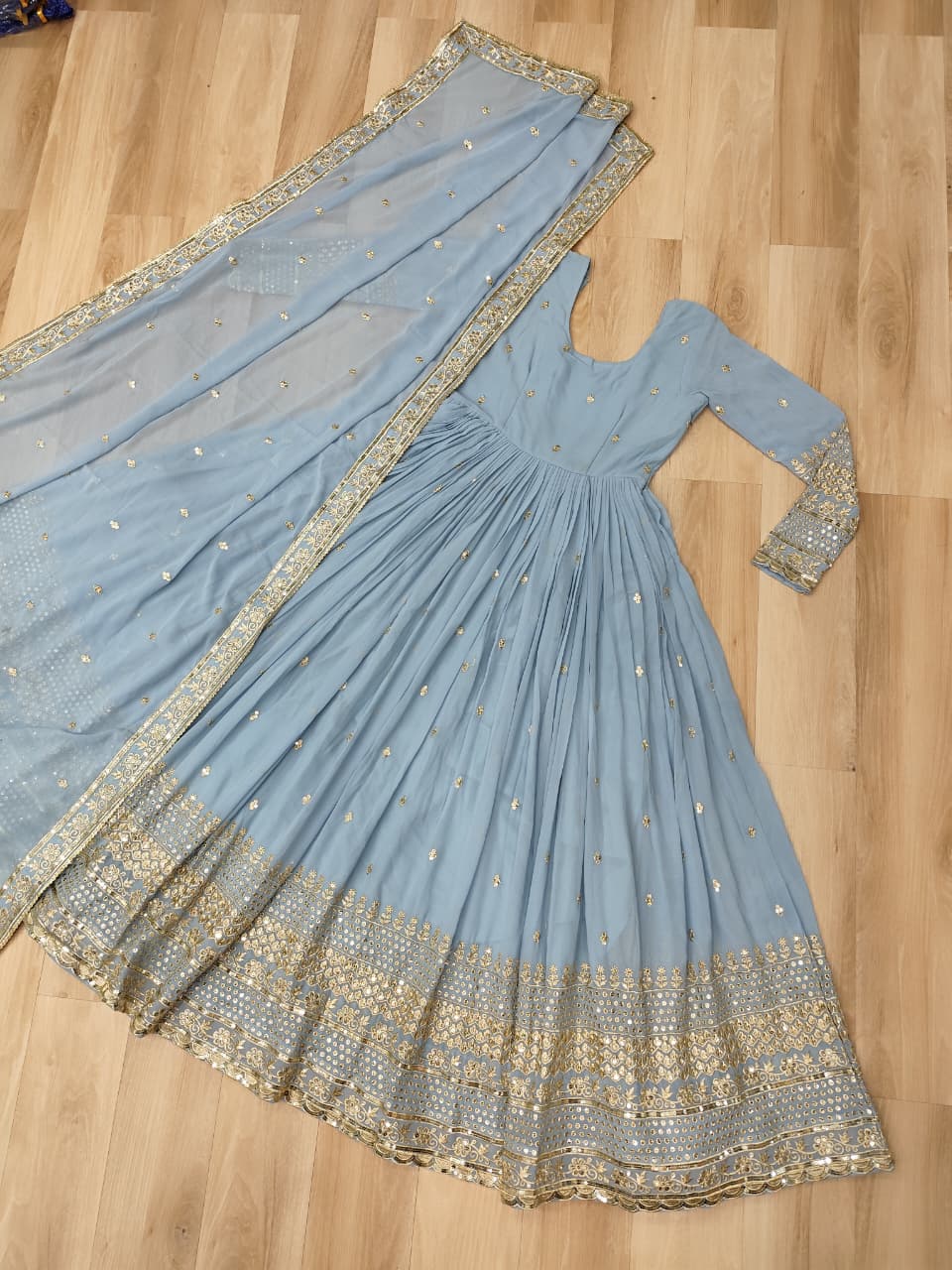 Unique Dusty Coloured Faux Georgette with Embroidered work Gown