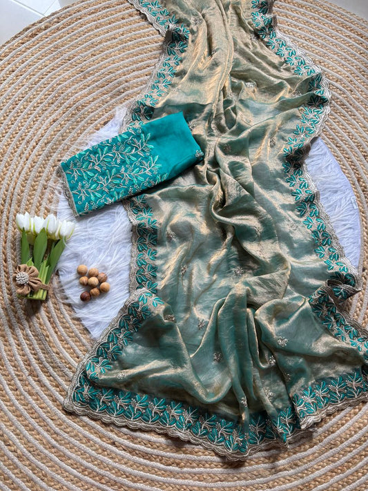 Rich Fandy silk blend fabric with a subtle sheen saree