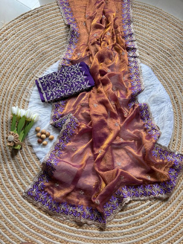 Rich Fandy silk blend fabric with a subtle sheen saree