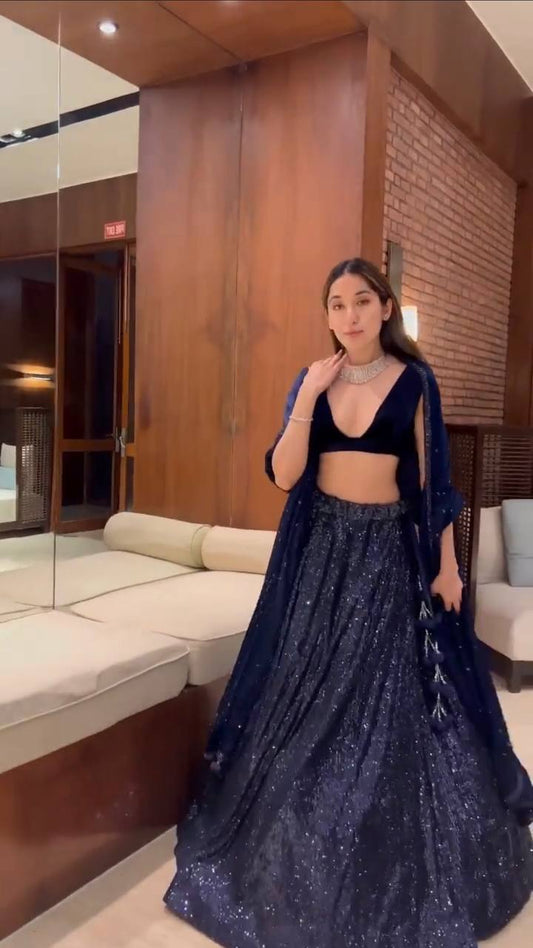 Turn Heads and Steal heart in this Gorgeous Sequins Lehenga Set