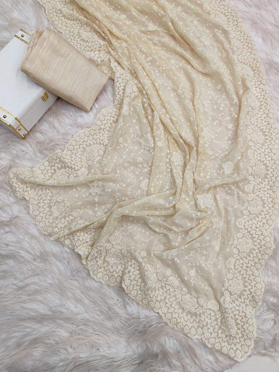 Soft Georgette fabric with white thread embroidered work Saree