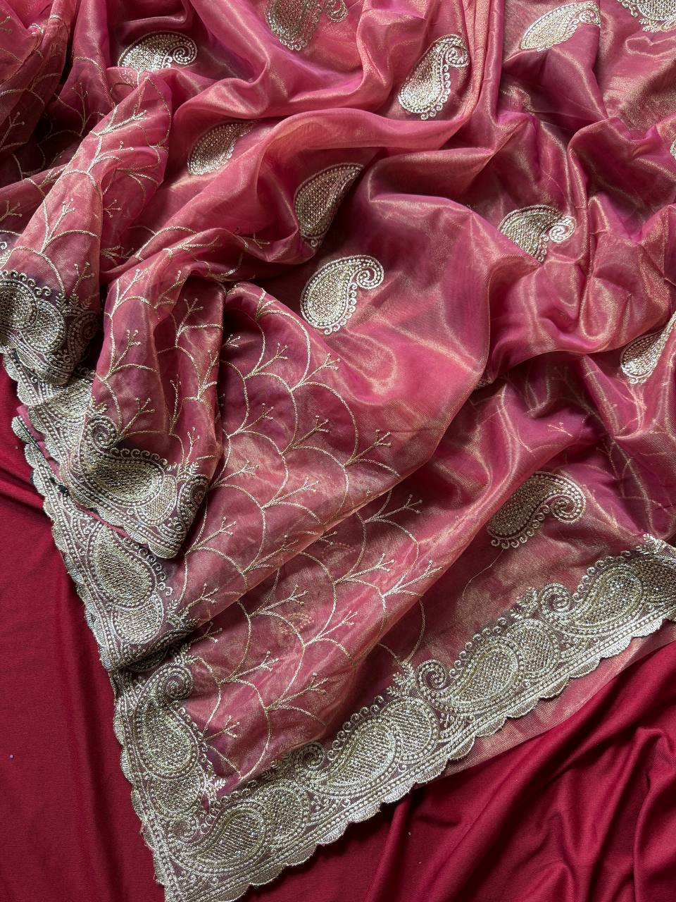 Pure zari tissue silk saree in a solid color with embroidery saree