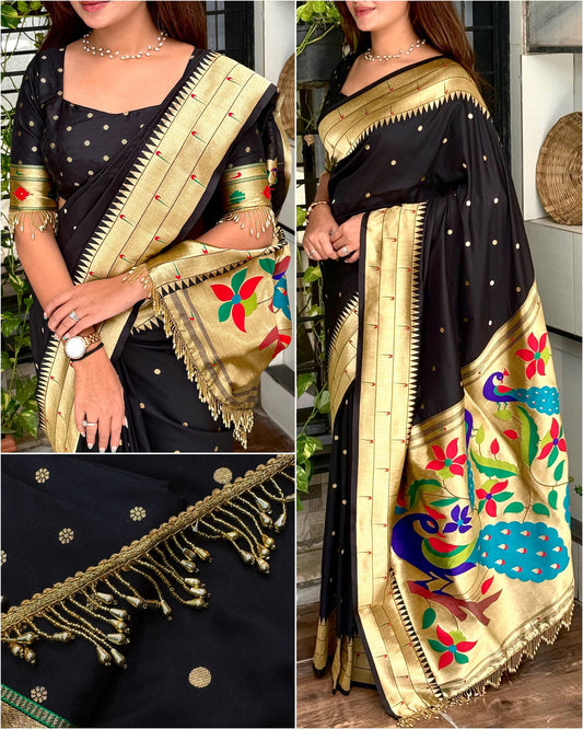 Royal blend of tradition and luxury Unveiling this black woven zari silk saree