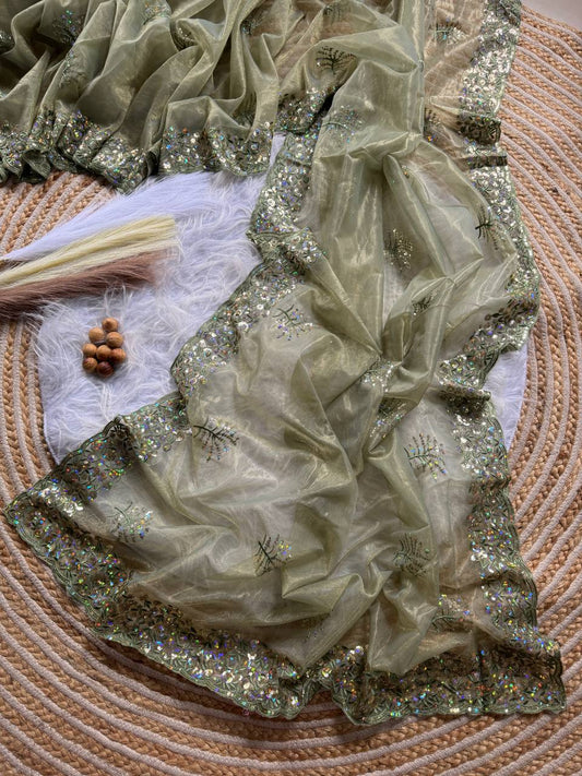 Pure Tissue silk saree in a solid color with embroidery viscos saree