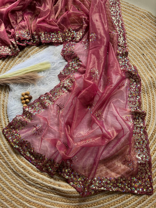 Pure Tissue silk saree in a solid color with embroidery viscos saree