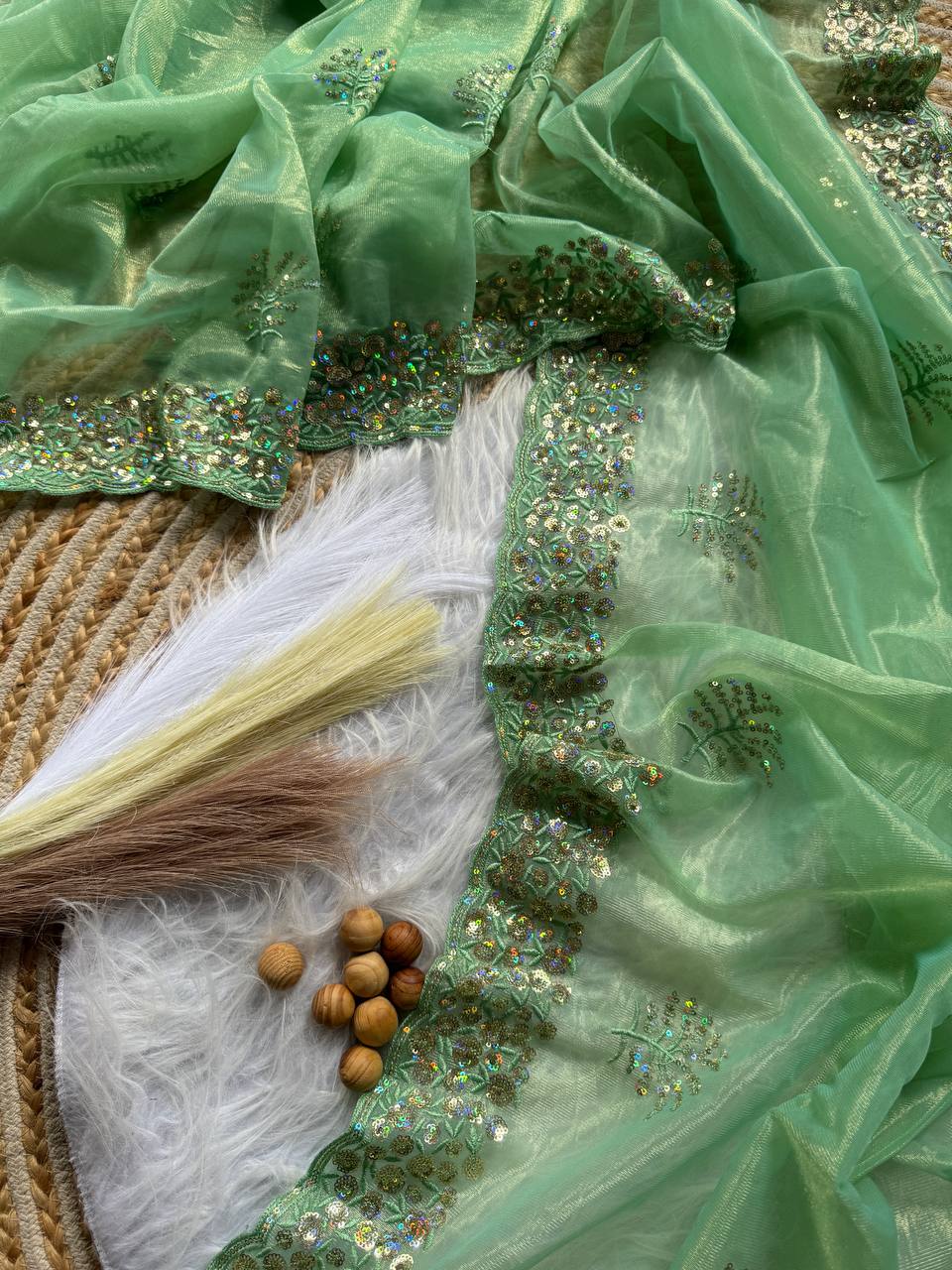 Pure Tissue silk saree in a solid color with embroidery viscos saree