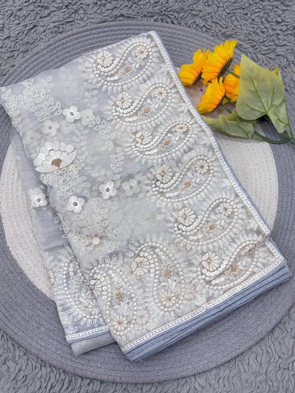 Organza Silk and the making being chikankari Saree
