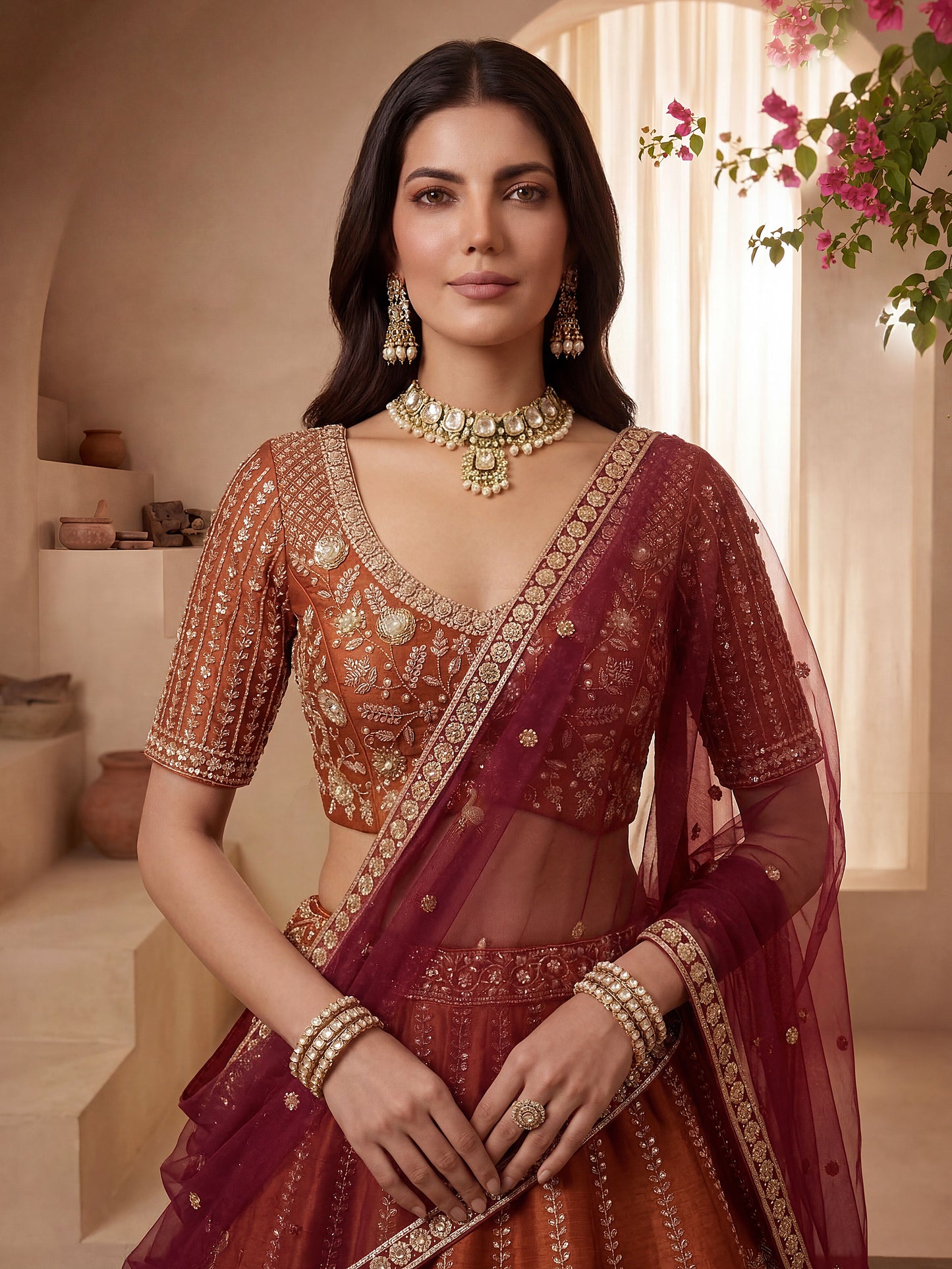 Gadhwal Silk And Dupatta Are Fabricated On Net Pair Lehenga