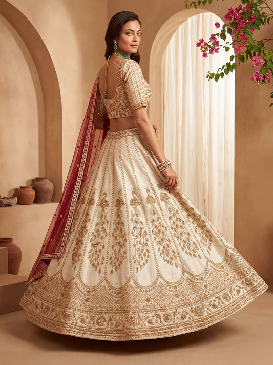 Gadhwal Silk And Dupatta Are Fabricated On Net Pair Lehenga