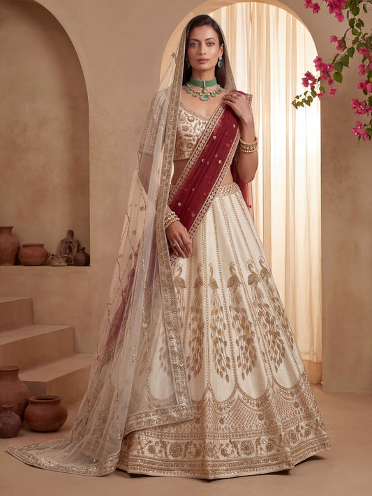 Gadhwal Silk And Dupatta Are Fabricated On Net Pair Lehenga