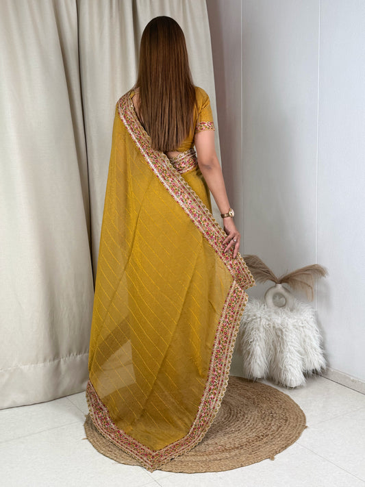 Zari & multi color thread embroidered work in saree