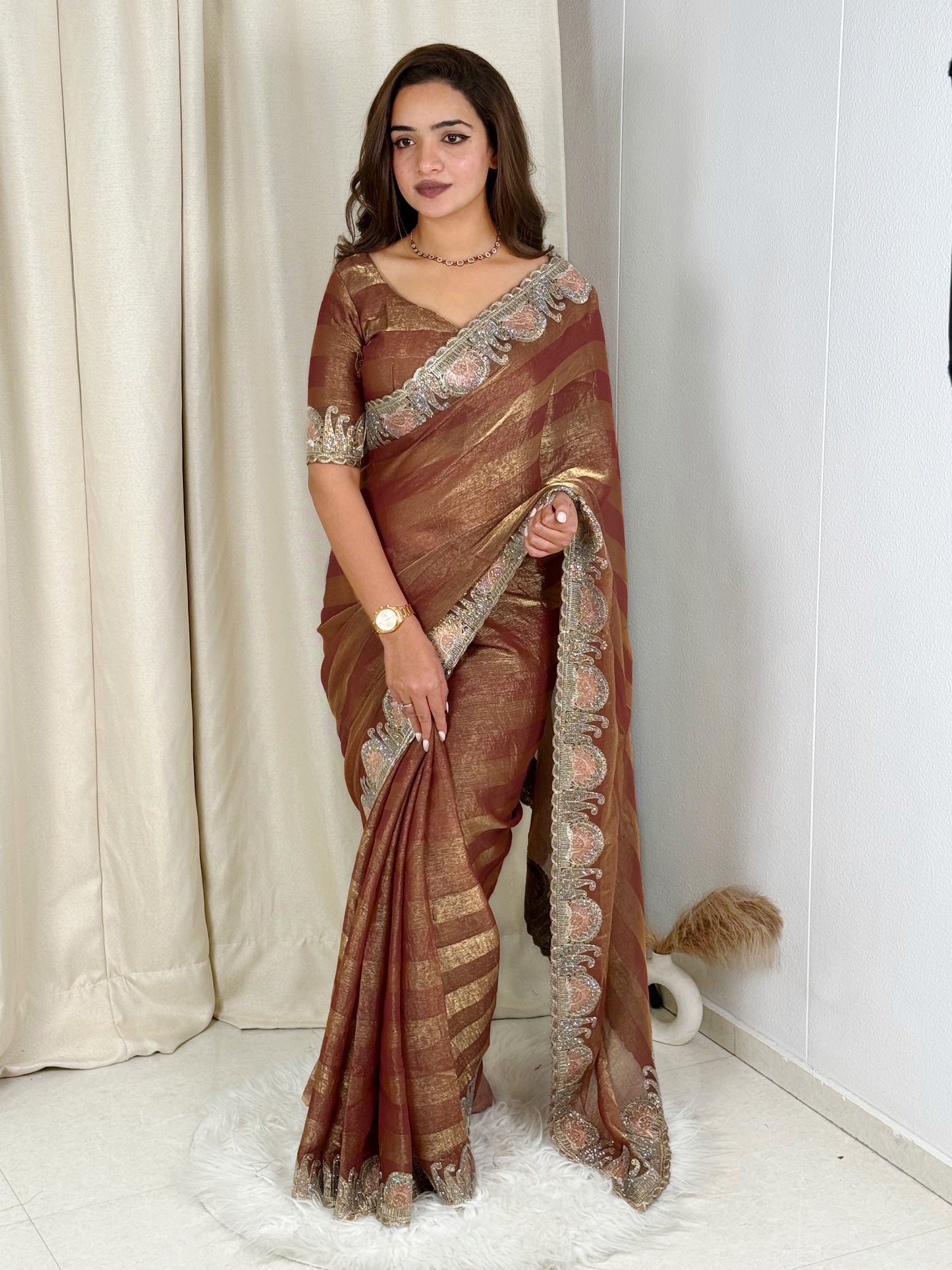 fandy chiffon saree adorned with intricate zari embroidered saree