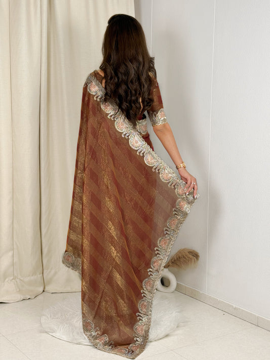 fandy chiffon saree adorned with intricate zari embroidered saree