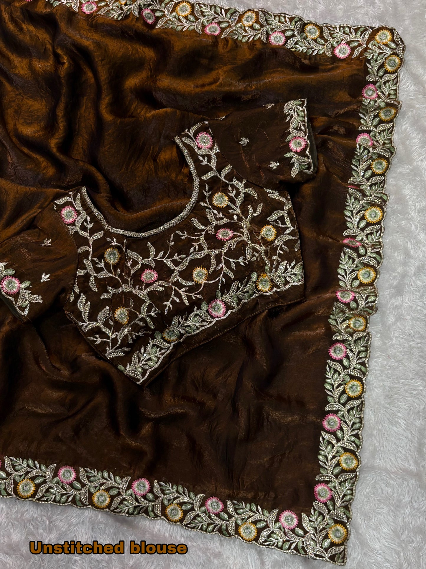 fandy satin saree adorned with intricate zari embroidered choli