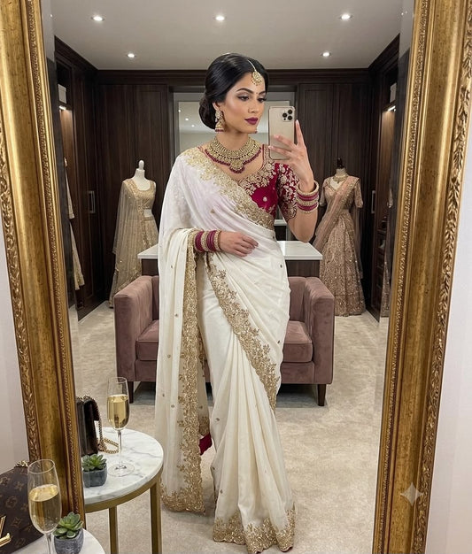 Elegant off-white rangoli silk fabric saree