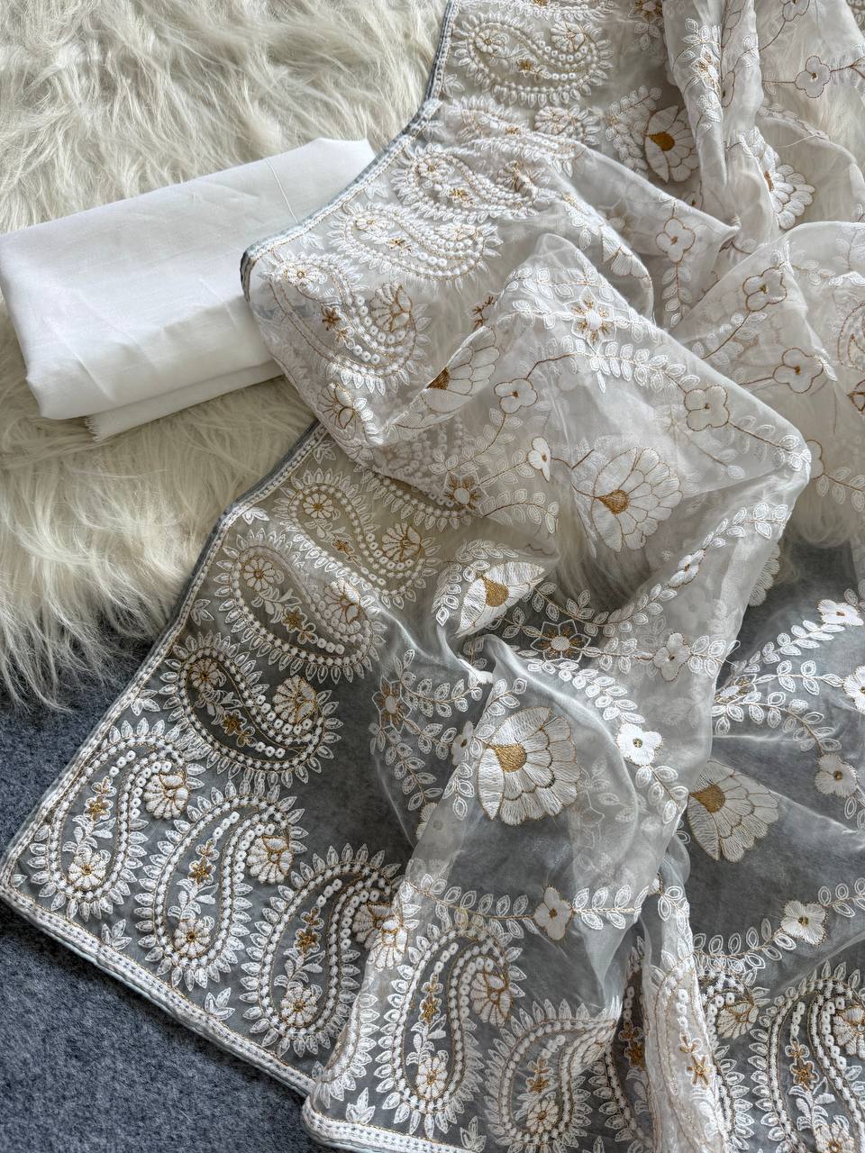 Organza Silk and the making being chikankari saree