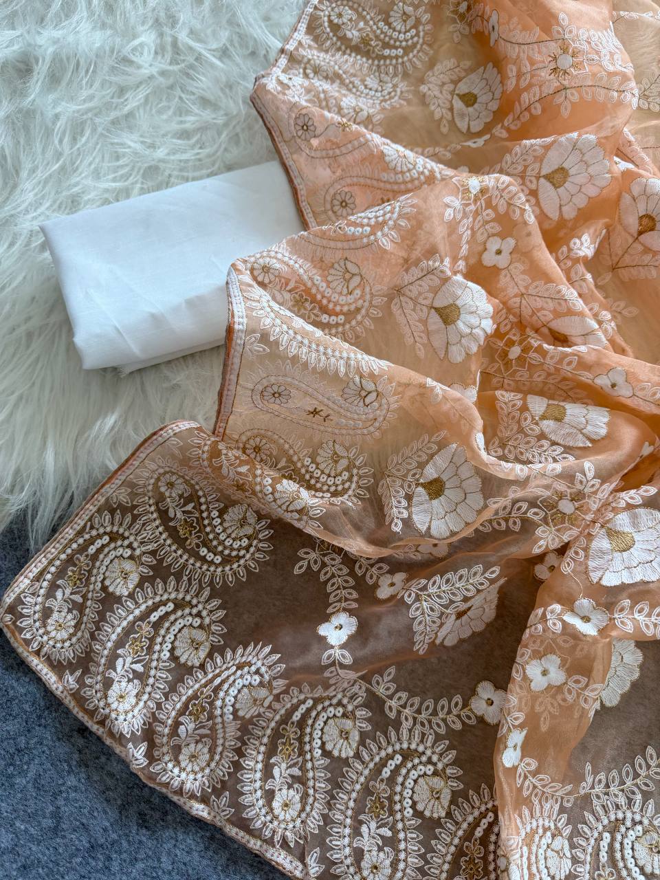 Organza Silk and the making being chikankari saree