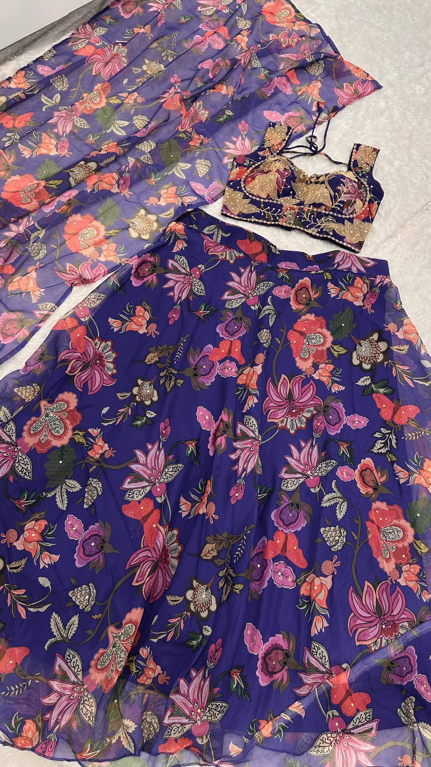 Tabby silk lehenga with floral print & stone work