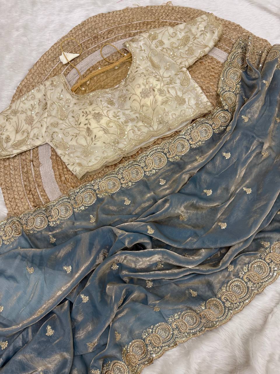 Soft space silk Satin Saree with heavy embroidery choli