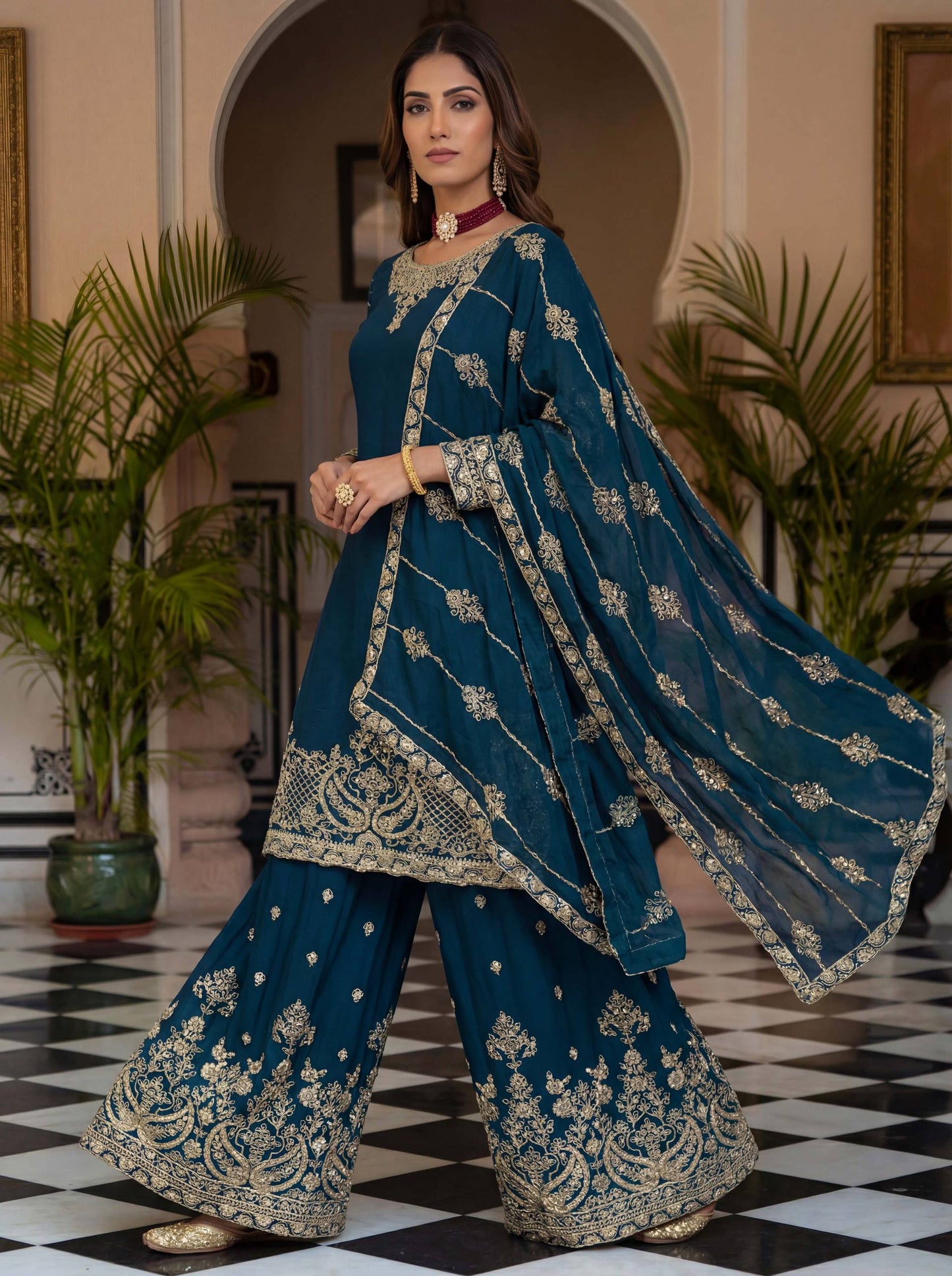 Elevate your festive style with these stunning embroidered sharara suits