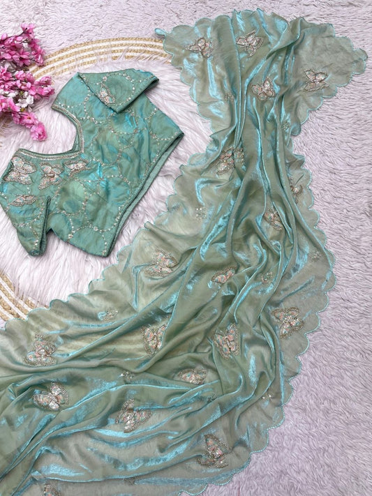 Beautiful khatli Brits work along with all over arco bodar saree