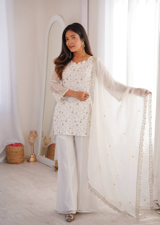 CRUNCHY SILK FABRIC WITH EMBROIDERY SEQUENCE AND JARI WORK SUIT