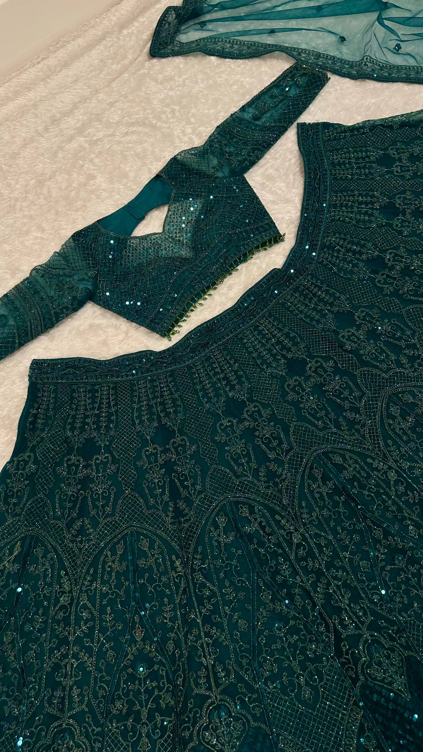 Net lehenga with Dori sequins & thread work Choli