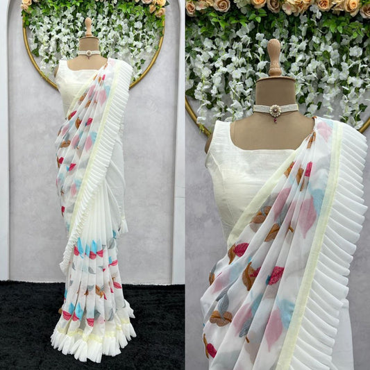 Beautiful Ruffle Designer Saree on Faux Georgette febric with Thred work and Hot Fix and Blouse on Benglori silk Fabric.