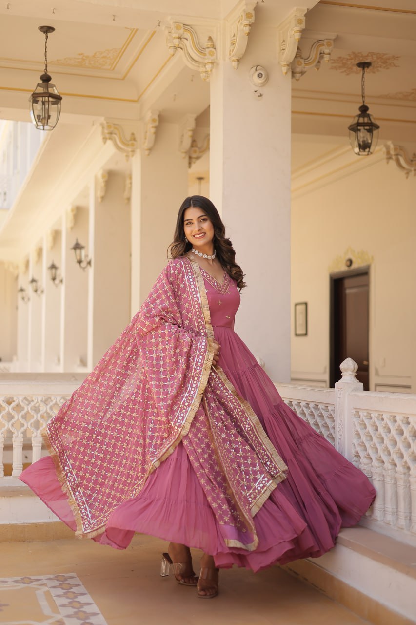 Discover the elegance of traditional attire with our Designer Festive Wear Gown