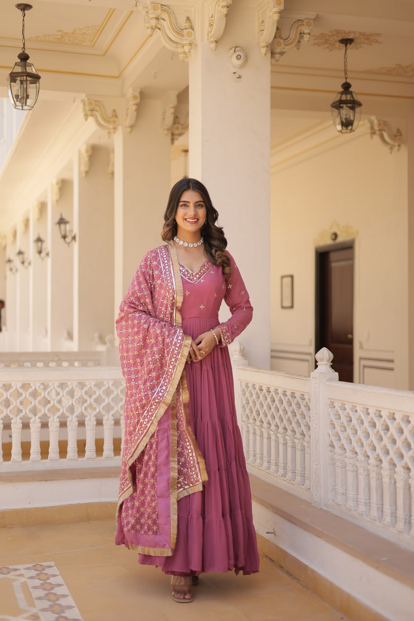 Discover the elegance of traditional attire with our Designer Festive Wear Gown