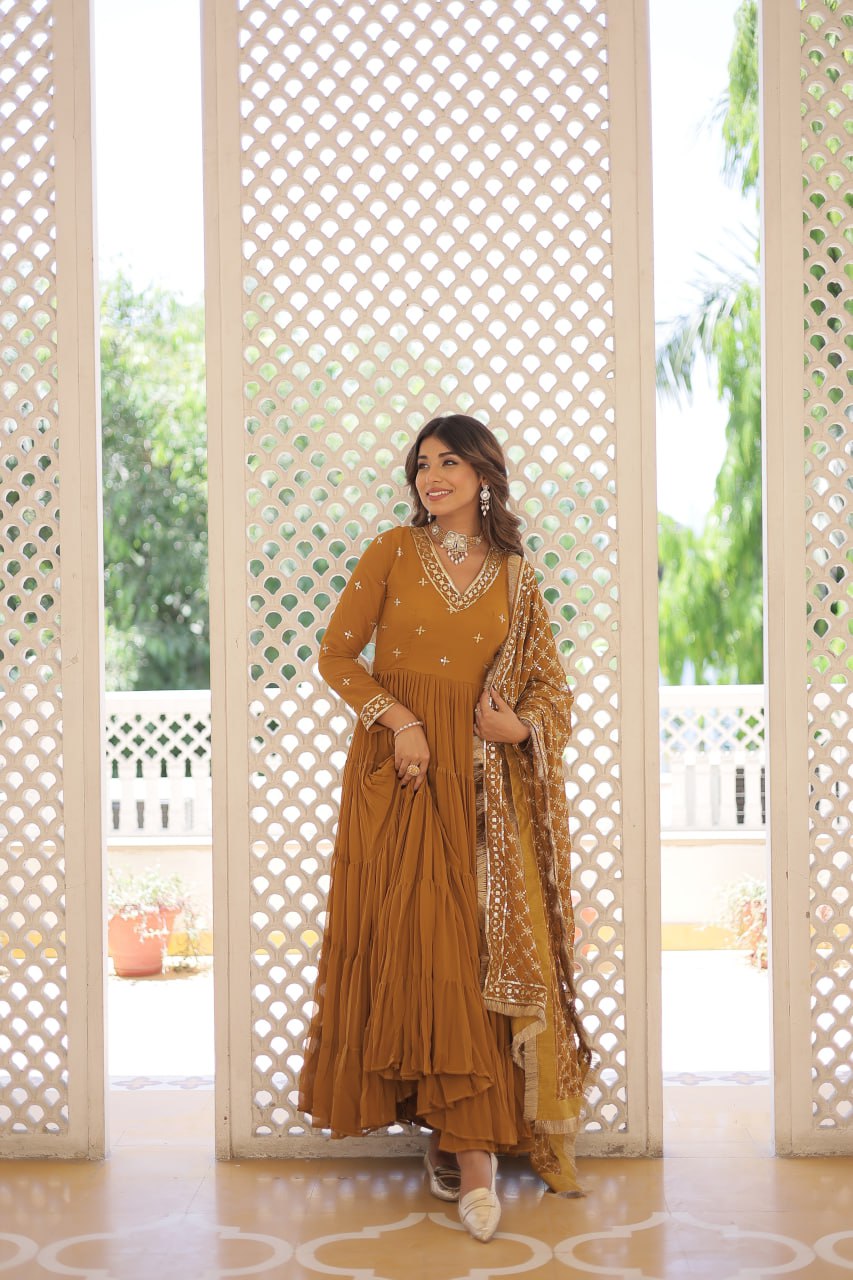 Discover the elegance of traditional attire with our Designer Festive Wear Gown