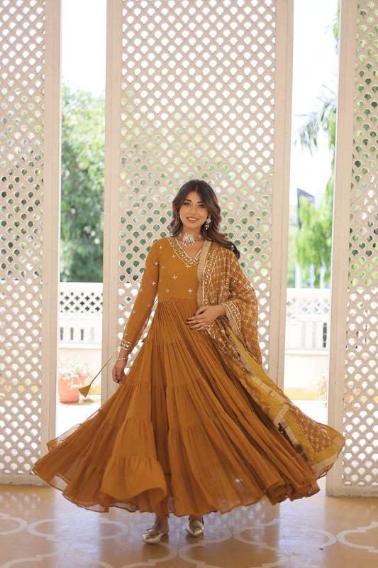 Discover the elegance of traditional attire with our Designer Festive Wear Gown