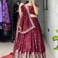 Dazzle in our embroidered burgundy lehenga