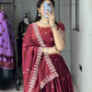 Dazzle in our embroidered burgundy lehenga
