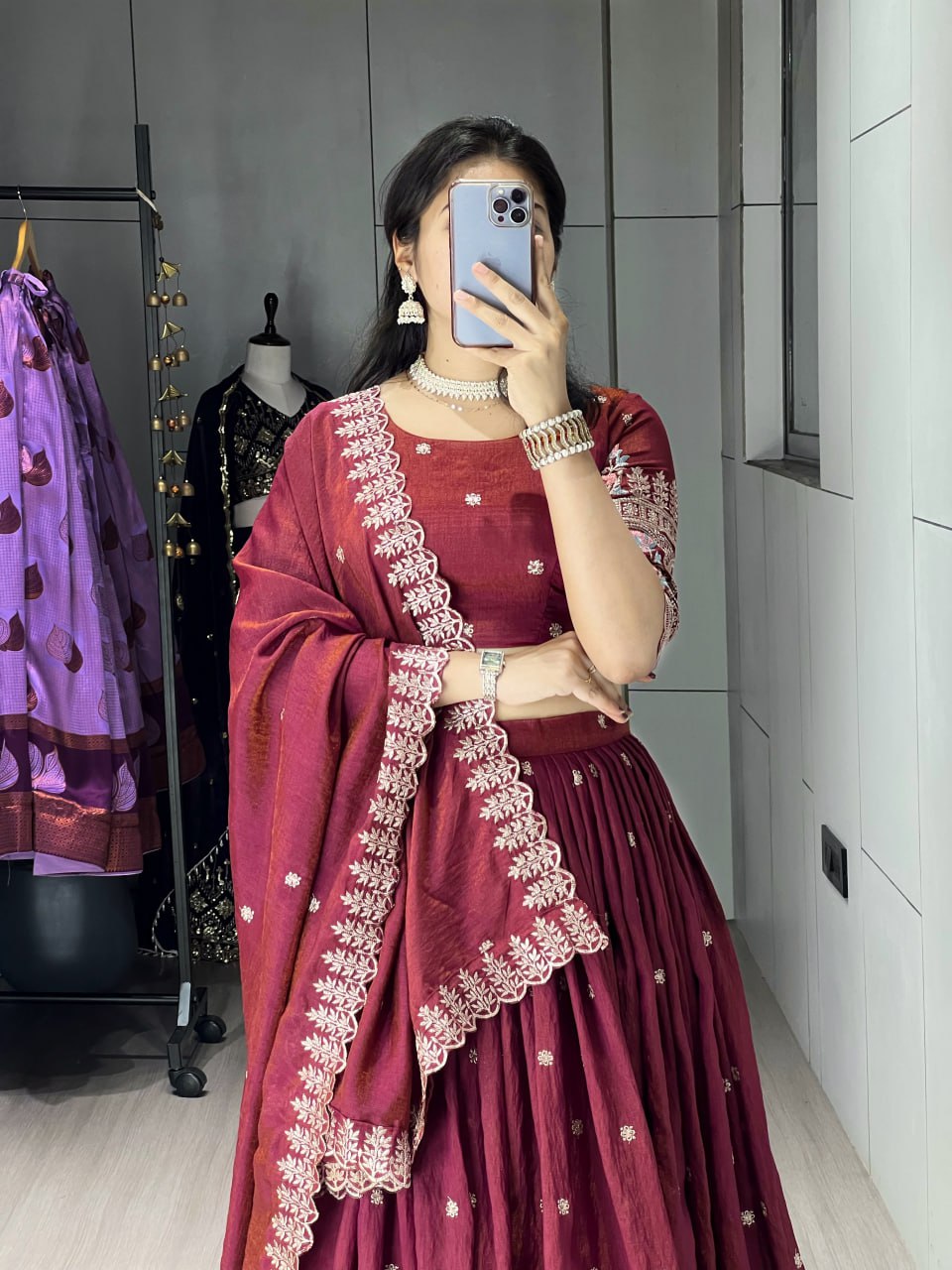 Dazzle in our embroidered burgundy lehenga