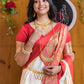 Silk Saree from the store is adorned with beautiful Zari work Saree