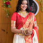 Silk Saree from the store is adorned with beautiful Zari work Saree