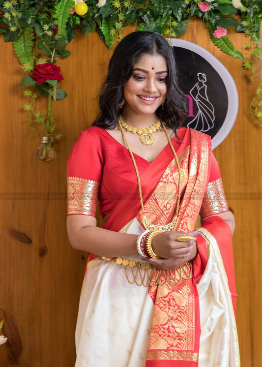 Silk Saree from the store is adorned with beautiful Zari work Saree