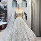 Einführung eines 4 Meter ausgestellten Lehenga mit Paillettenstickerei und Cut-Work