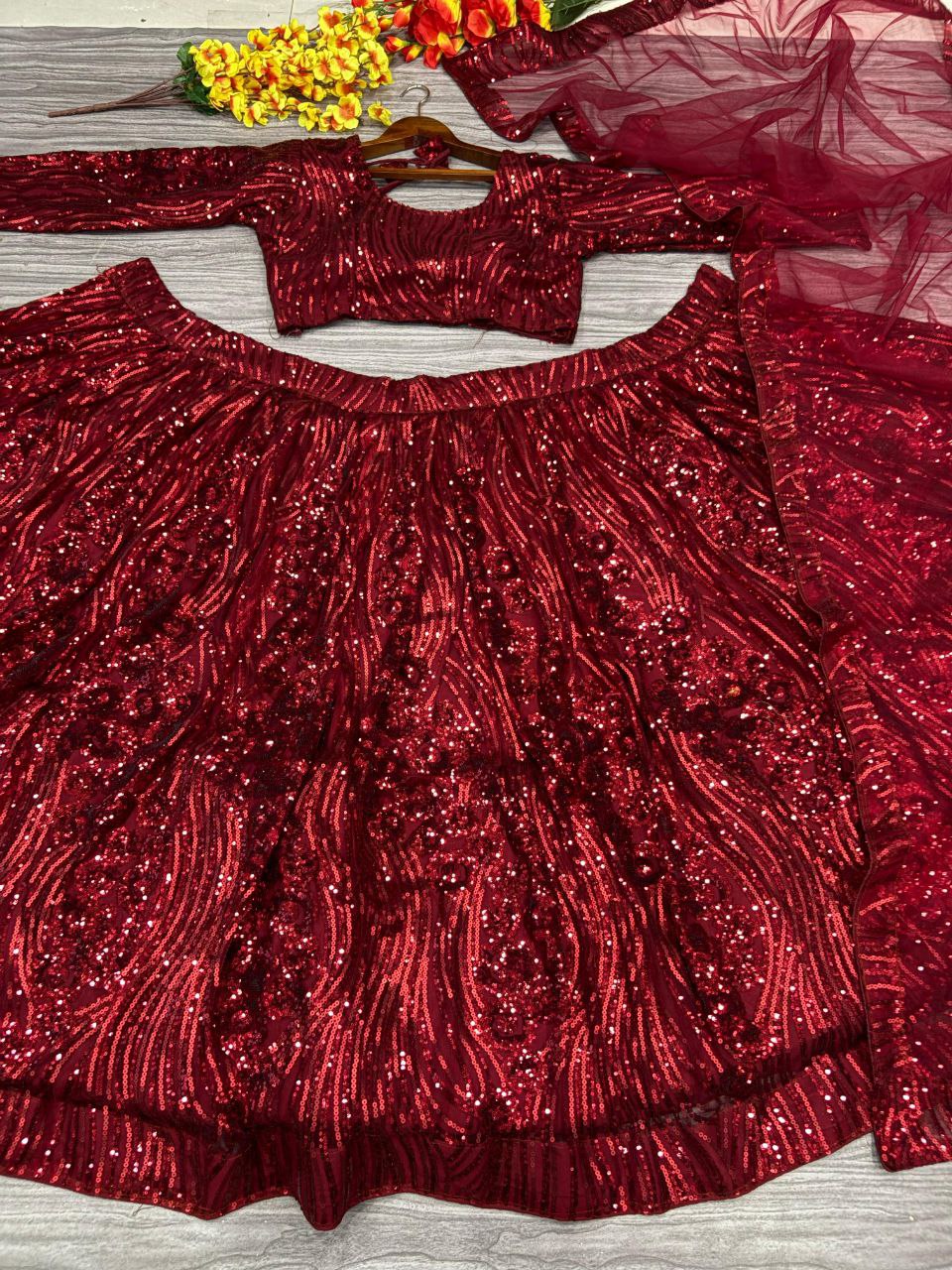 Premium Net Embellished With Beautiful Lehenga Choli