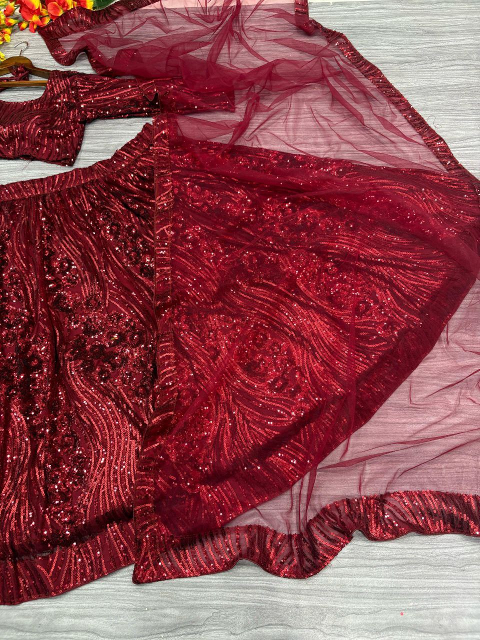 Premium Net Embellished With Beautiful Lehenga Choli