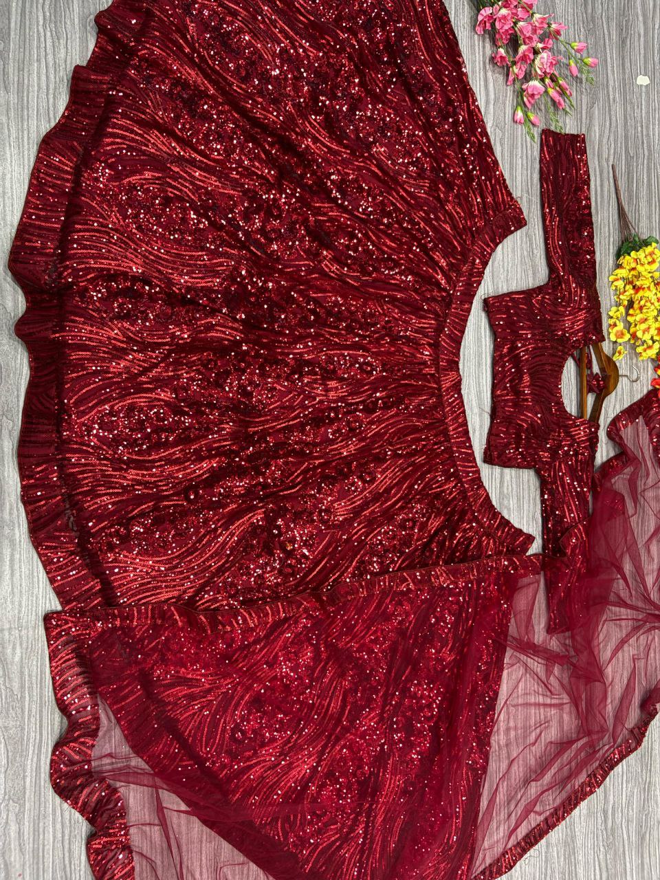 Premium Net Embellished With Beautiful Lehenga Choli
