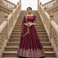 Dazzle in our embroidered burgundy lehenga