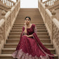 Dazzle in our embroidered burgundy lehenga