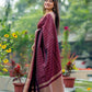 adorned with beautiful Zari work in form of traditional motifs