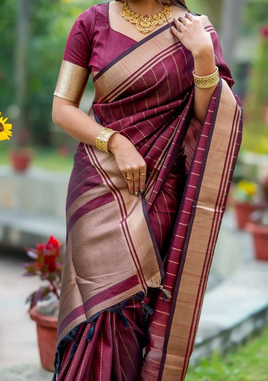 adorned with beautiful Zari work in form of traditional motifs