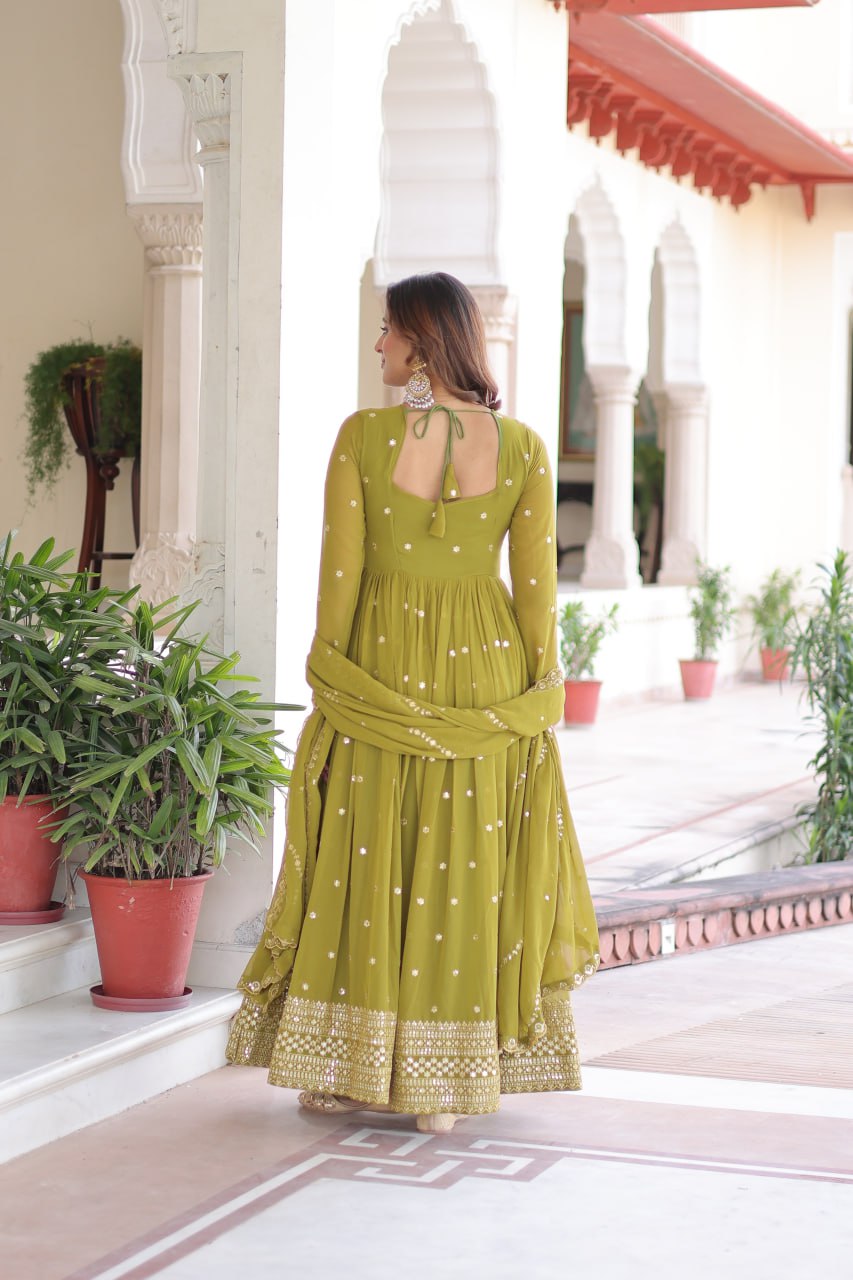 Faux Georgette with Rich Sequins & Zari Embroidered work Gown
